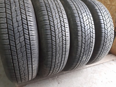 Шини на авто в хорошому стані Yokohama Geolendar G 033   шириною 215 висотою 70 радіусом R 16 низькі ціни